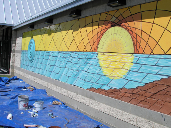 ork nearing completion on Vanston Pool mural, left